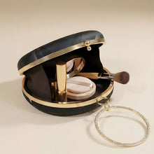 Golden Eclipse Woman Round Clutch